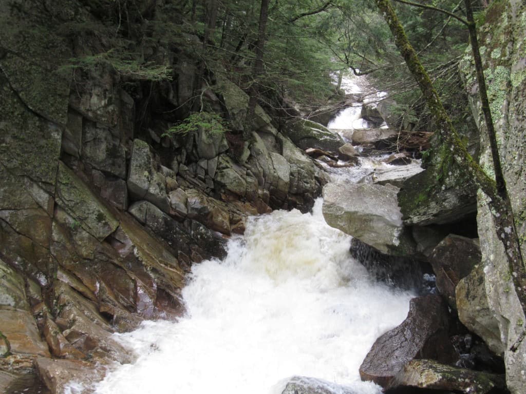 Falls of Lana multi-tier drop in the Green Mountain forest