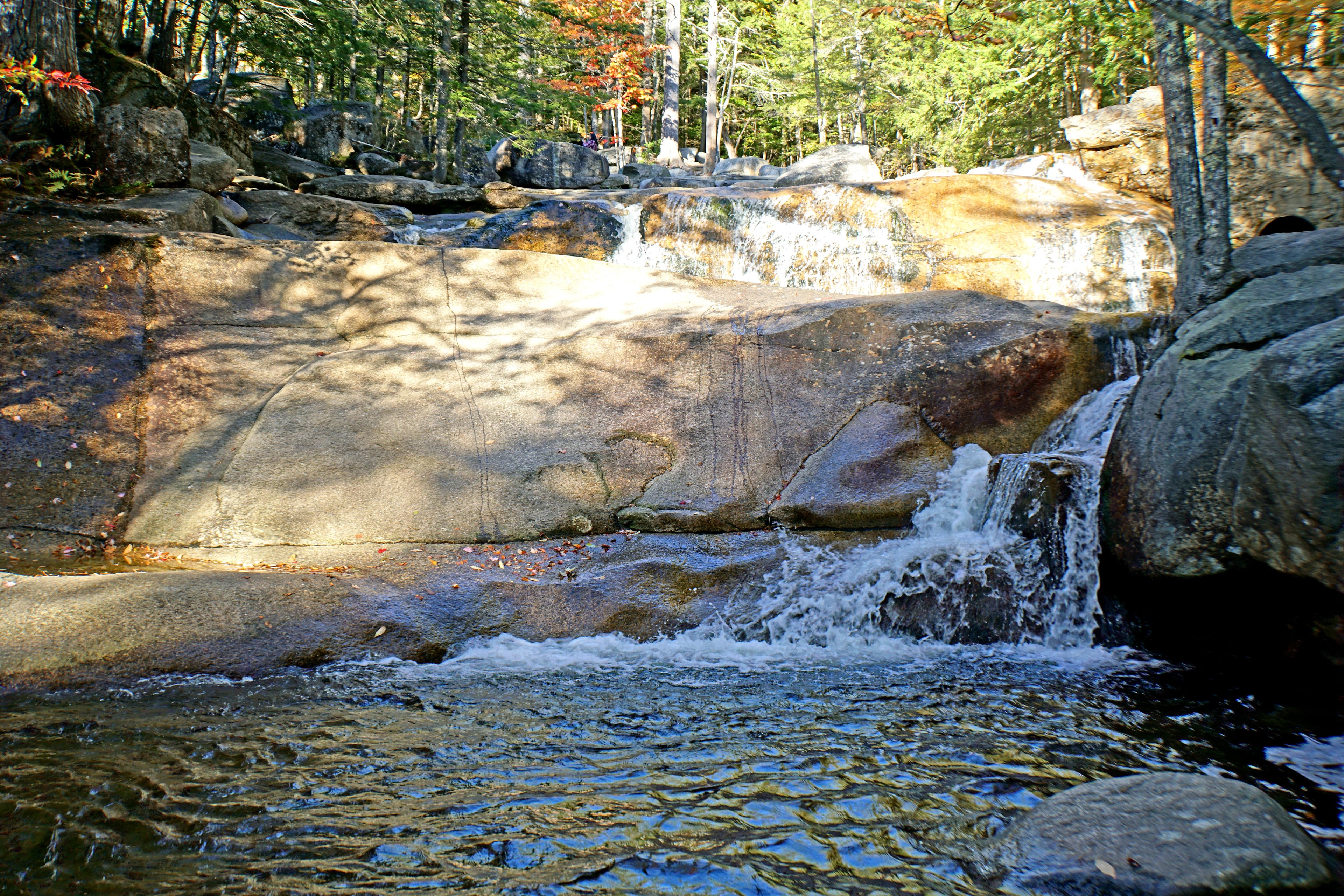 Diana's Baths in the White Mountains, with polished granite and moving water.
