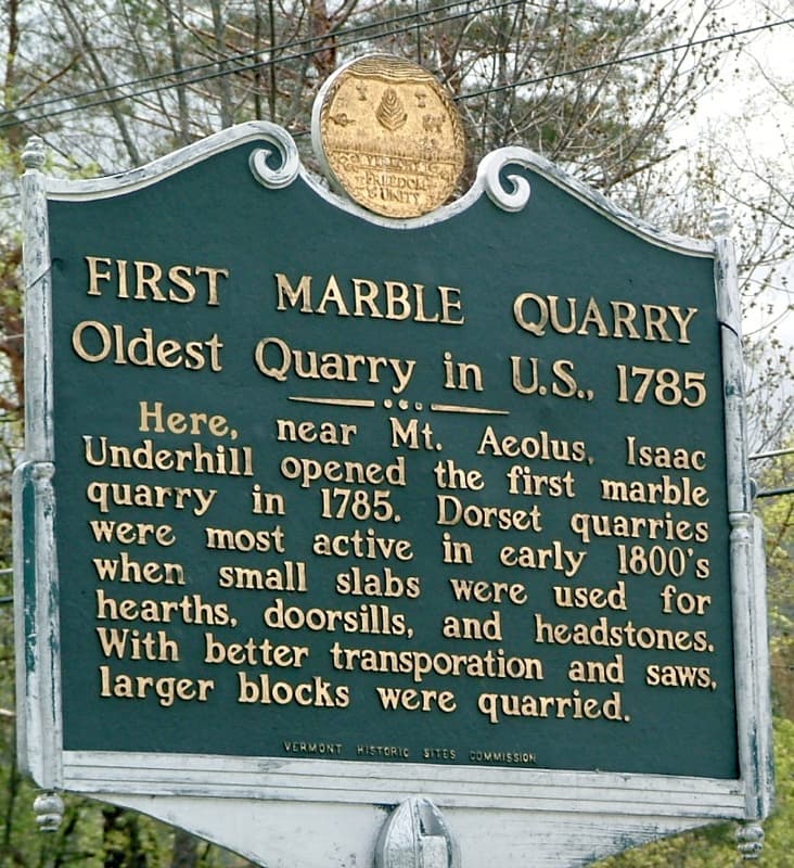 Dorset Quarry cliffs and green water in Vermont.