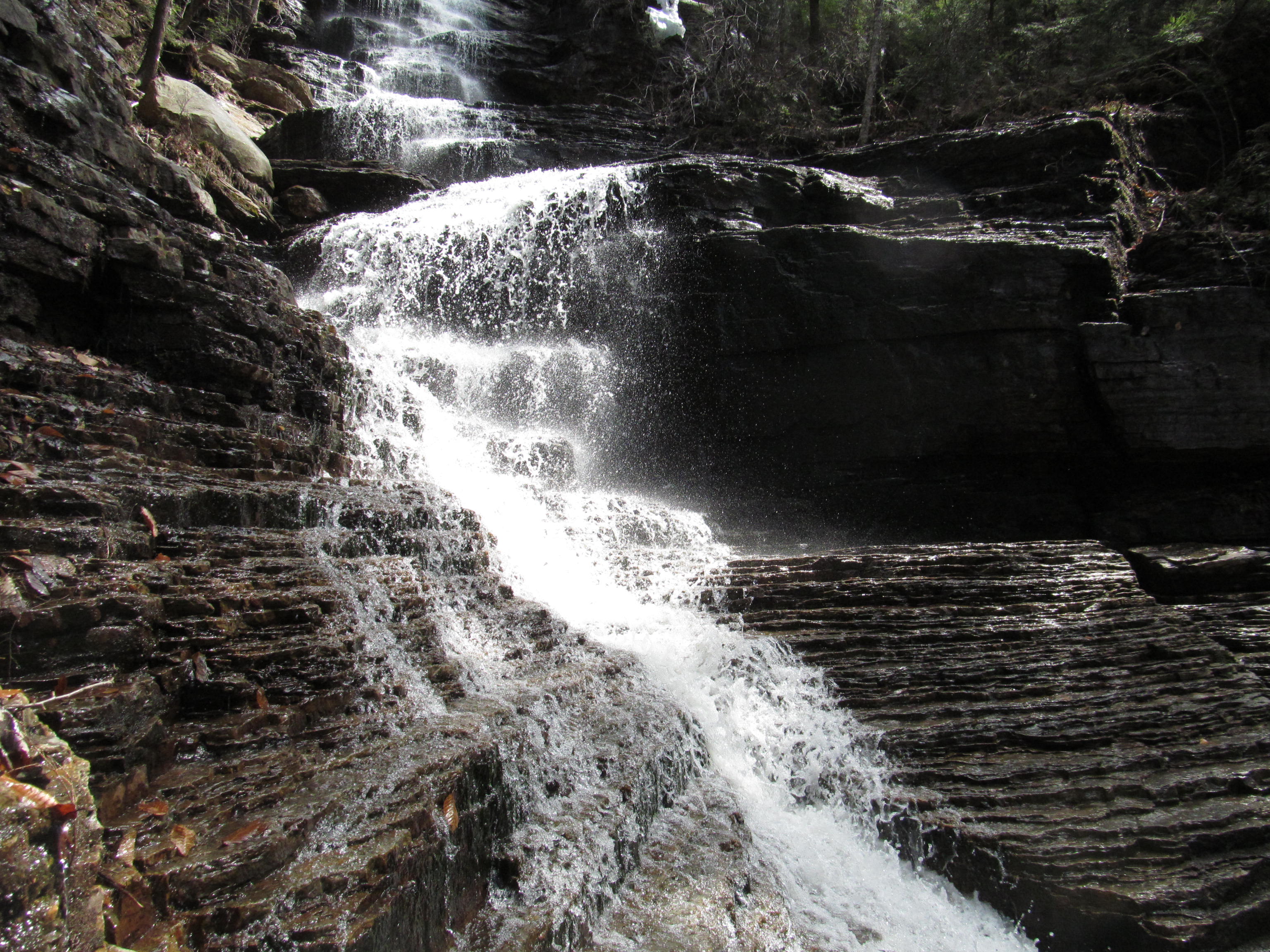 Main cascade at Lye Brook Falls near Manchester, Vermont, dropping over layered dark rock in spring flow.